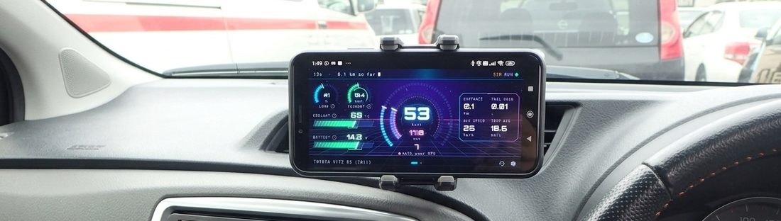 The cockpit in the Neon Horizon theme on a phone mounted to a car dashboard